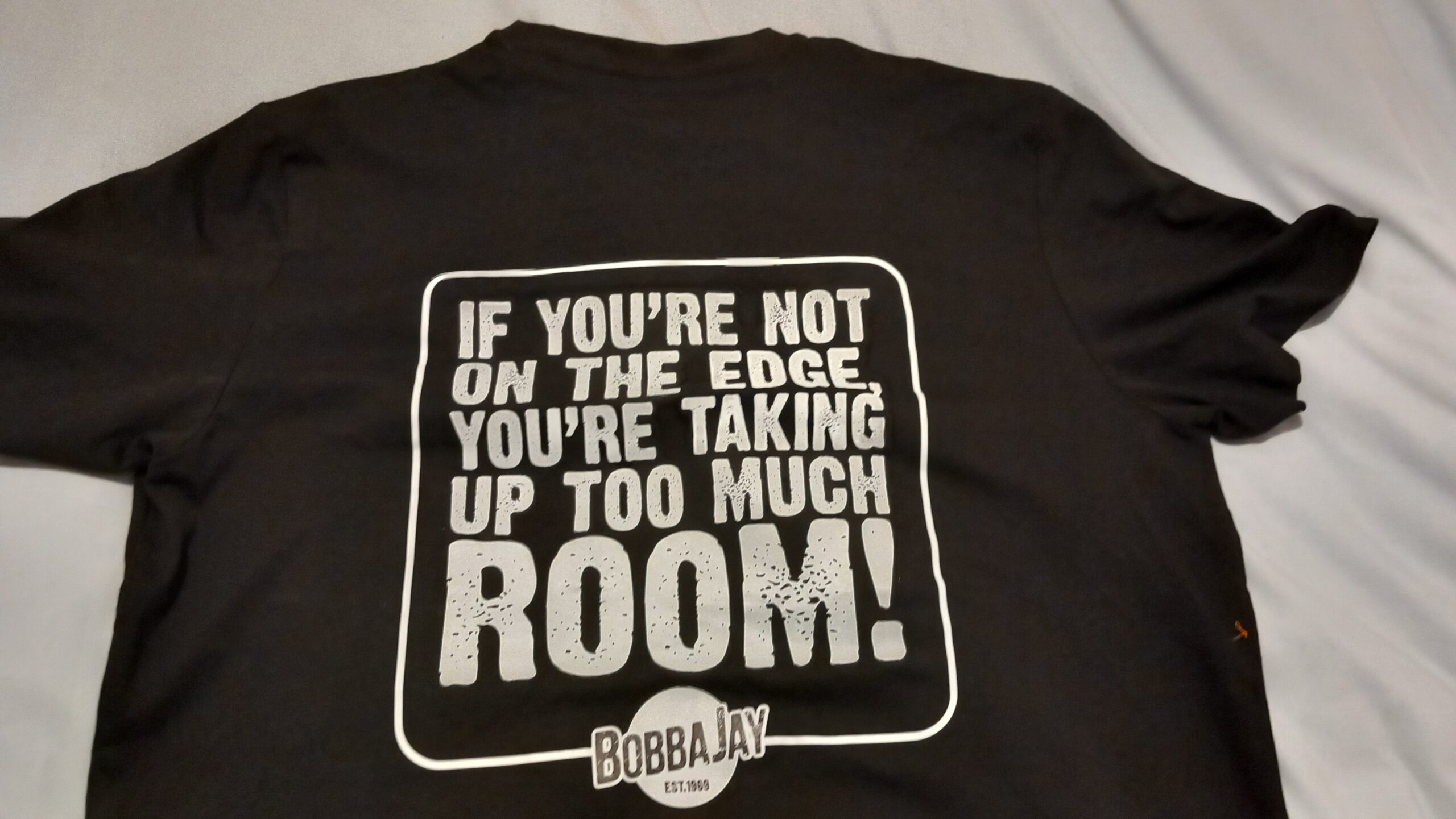 On the edge black T shirt